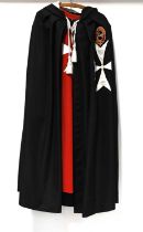 An Order of St. John ceremonial tabard and hooded cloak bearing a gold embroidered panel for '