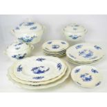 TOURNAI; a sixteen-piece 18th century part dinner service, blue and white floral decoration,