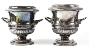 A pair of 19th century Old Sheffield Plate twin-handled wine coolers of campagna form, to stepped