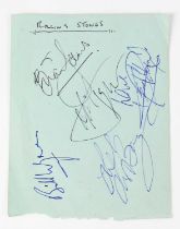 THE ROLLING STONES; a torn page from an autograph book bearing signatures of Mick Jagger, Bill