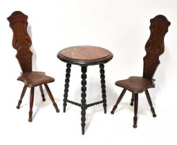 A pair of reproduction spinning chairs with carved floral decoration, height 91cm, together with a