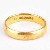 A 22ct gold wedding band, size N, approx. 4.5g.