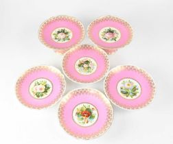 A 19th century porcelain part dessert service comprising a pair of tazzas, 11 x 21cm, four comports,