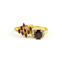 A 9ct gold ruby cluster ring, size O, approx. 2g, together with a 9ct gold claw set garnet ring with