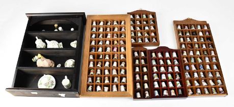 A quantity of mainly ceramic thimbles, to include Royal Doulton examples, a set of twelve 'The