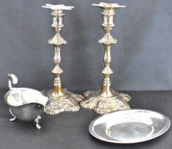 A pair of Victorian Neo-Classical style candlesticks with six pointed floral sconce above turned