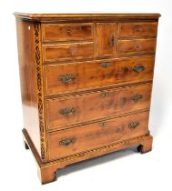 A Georgian-style yew wood open backed cabinet with sliding faux drawer front, 106 x 89 x 54cm.