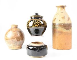 A slipware covered jar by Regine Hahn for Pantasaph Pottery, height 18cm, together with three