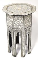 A Syrian mother of pearl and bone inlaid octagonal topped occasional table, 72 x 47cm. Condition