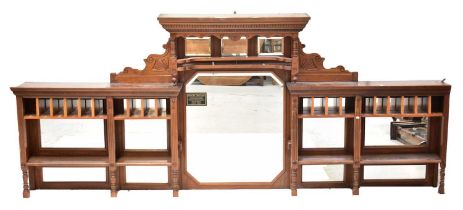 An unusual bar constructed from the front panel of a Victorian sideboard with additional flanking
