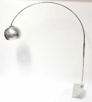 An Arco-style floor lamp on a square marble base.