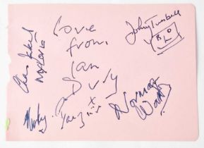 A torn page from an autograph book multi-signed by members of Ian Dury and The Blockheads, to