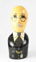 A painted wooden bust of a bespectacled, suited gentleman, height 44cm. Condition Report: Some