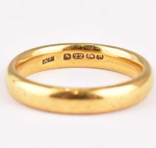 A 22ct gold wedding band, size O, approx. 6.7g.