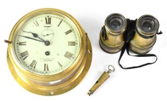 A brass ship's clock by D. Neill Ltd, Belfast, the white enamelled dial set with Roman numerals