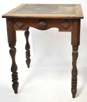 An early 20th century oak square top side table with leather insert, 75 x 64 x 64cm.