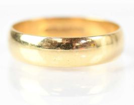 A 9ct gold wedding band stamped '375', size U 1/2, approx. 3.6g.