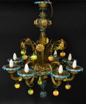 A Murano glass eight-branch electrolier with blue highlight and encrusted with flowers, apple and