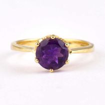 A 14ct gold single claw set amethyst ring, size N, approx. 2.6g.