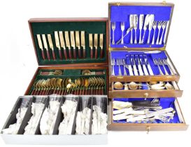 Two wooden cased cutlery sets and a Royal Doulton boxed set of six hand cut crystal champagne