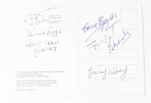 THE GREAT TRAIN ROBBERY; a postcard bearing the signatures of Ronnie Biggs, Bruce Reynolds, Buster