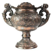 A 19th century bronzed metal twin-handled planter of Baroque style, with embossed strapwork and