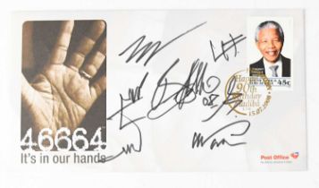U2; a first day cover bearing band members' signatures. Condition Report: - We have not
