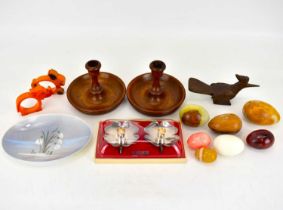 A collectors' lot comprising various polished onyx eggs, a wooden kookaburra, two vintage Bakelite