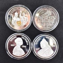 Four Elizabeth II commemorative 925 silver crowns comprising two issued from Turks & Caicos
