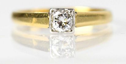 An 18ct yellow gold ring set with a white stone, size N, approx. 2.8g, and a further ring set with a