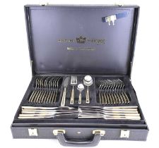 SOLINGEN, WEST GERMANY; a seventy-piece Berlin pattern gilt-heightened cutlery service, in black