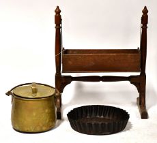 A wooden swinging plant trough, together with a brass lidded coal bucket and a metal oversized