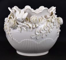 BELLEEK; a late19th/early 20th century white porcelain jardinière, encrusted with applied swags of