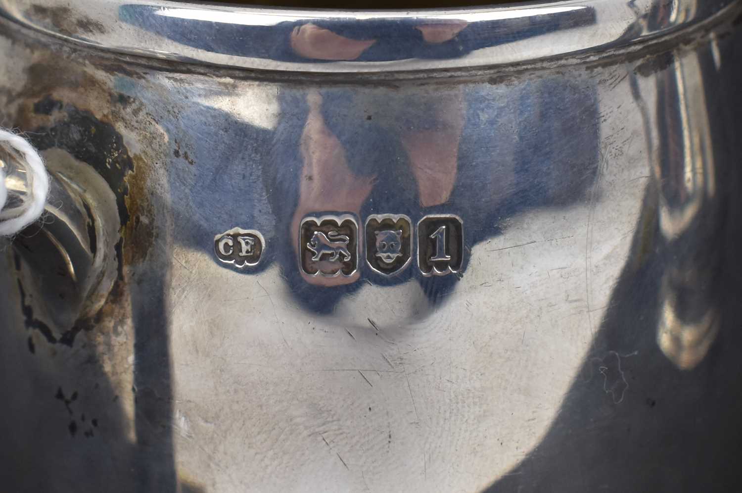 A George III hallmarked silver baluster form mug with ear-shaped handle, initialled 'A' within - Image 4 of 4