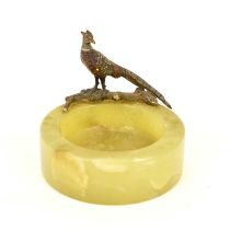 A 1930s cold painted bronze pheasant on a small green onyx dish, 7 x 8cm.