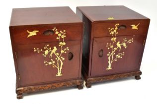 A pair of Oriental-style stained mahogany bedside cabinets, with bone inlaid detail of flora and