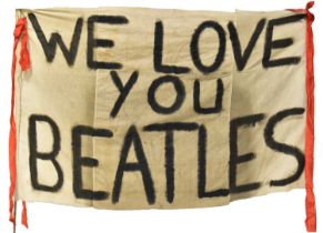 THE BEATLES; a hand made concert banner inscribed 'We Love you Beatles', by repute signed by