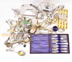 A collection of mixed plated ware to include a teapot, cutlery, a glass and plated sardine dish,