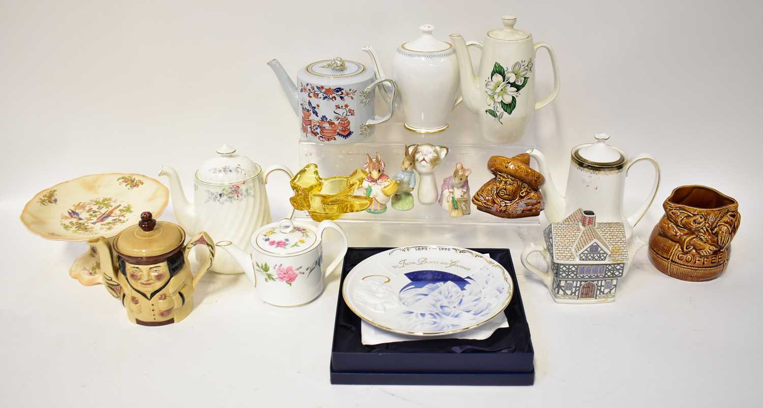 A quantity of decorative teapots including Royal Albert 'Silver Maple', Ironstone Broadhurst