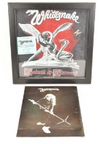 WHITESNAKE; a 1982 framed concert T-shirt, 'Saints and Sinners', glazed and boxed, 37.5 x 37.5cm,