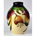 MOORCROFT; an 'Anna Lily' cream ground vase, copyright stamp to the base for 1998, height 20cm.