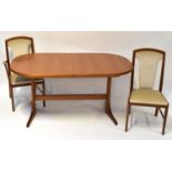 E. S. A. & MCINTOSH LTD; a mahogany dining room suite comprising oval extending dining table, with