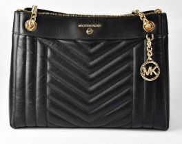 MICHAEL KORS; a 'Susan' quilted shoulder bag in black leather. Condition Report: Good condition used