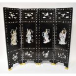 A contemporary black lacquered and mother of pearl inlaid four-leaf three-fold screen with brass