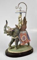 LLADRÓ; an 'Indian Princess Elephant' figure depicting a young lady on an elephant, raised on an