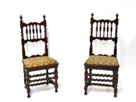 A pair of 19th century fruitwood side chairs in the 17th century manner, with turned spindle