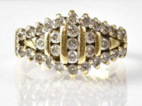 A 14ct diamond cluster ring with an arrangement of thirty-one 0.03ct diamonds, size K, approx. 5g.