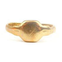 A 9ct gold small signet ring with indistinct initials to the top, size J, approx. 2g.