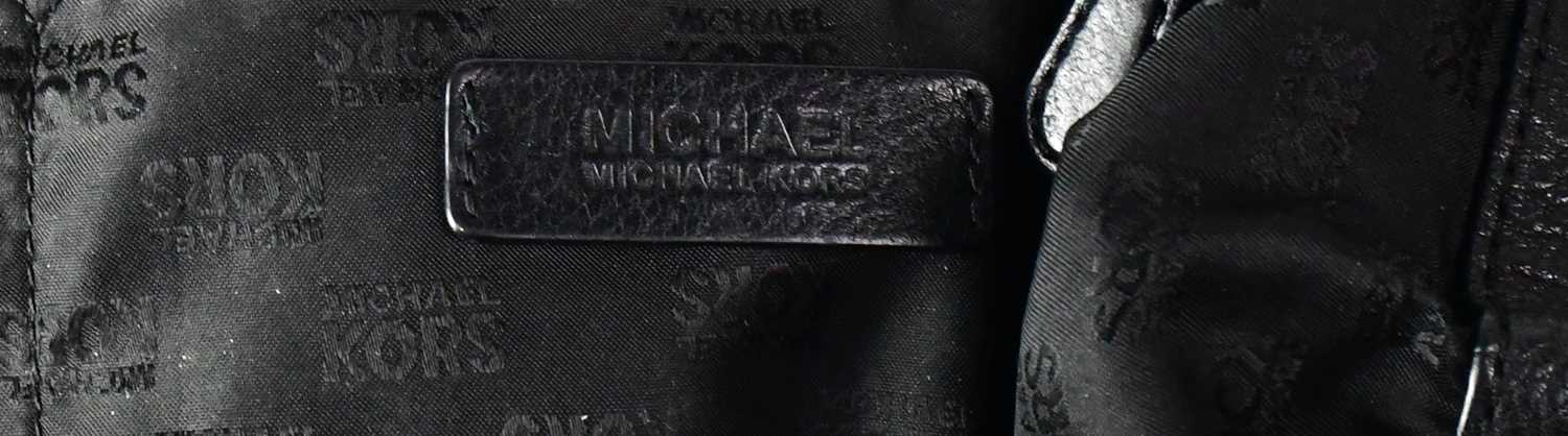 MICHAEL KORS; a black pebbled leather hobo shoulder bag, with a similar Michael Kors purse/wallet ( - Image 3 of 4