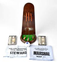 A small collection of golfing-related collectors' items, to include a steward's armband for the
